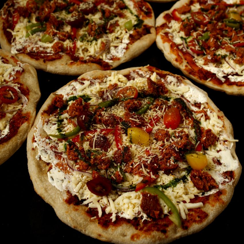 spicy sausage, cream cheese, jalapeno, capsicum, cherry tom & parmesan