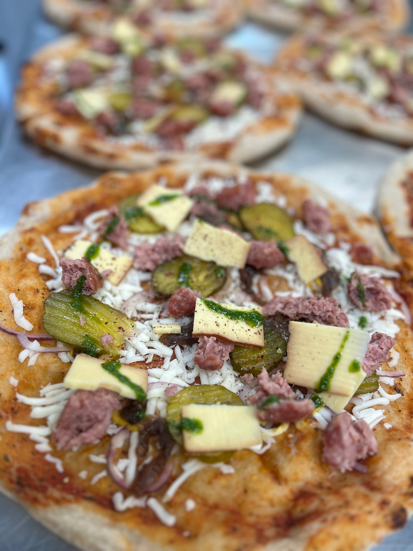 kransky sausage, smoked cheese, onion jam, pickles & jalapeno mustard